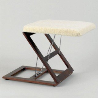 Reposapiernas plegable