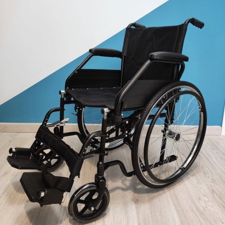 Silla de ruedas plegable de acero
